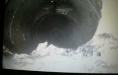 Camerabeeld van een leiding op 7,5 meter